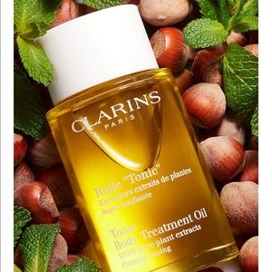 Clarins “Tonic” treatment body oil for women/men.